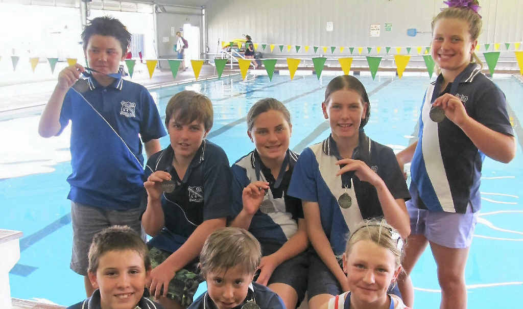 Age champions at the Clifton State Primary School swimming carnival (back from left) Ty Norris, Rex Johnson, Taliesha Leslie, Emily Craig, Lucy Mantova (front) Jack Kindelan, Jordan Stevenson, and Naomi Simpson. Absent was Jackson Free. Age champions at the Clifton State Primary School swimming carnival (back from left) Ty Norris, Rex Johnson, Taliesha Leslie, Emily Craig, Lucy Mantova (front) Jack Kindelan, Jordan Stevenson, and Naomi Simpson. Absent was Jackson Free.